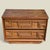 A single vintage nightstand by Bassett Furniture Industries with a warm wood finish, two useful drawers, and a carved...