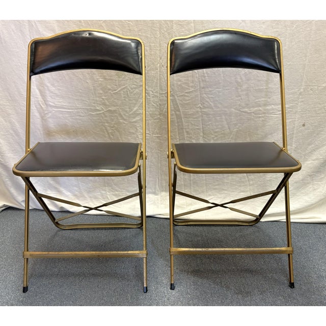Timeless pair of folding game chairs by A. Fritz & Co. from the 1960's made in New York. These have a Hollywood Regency/...