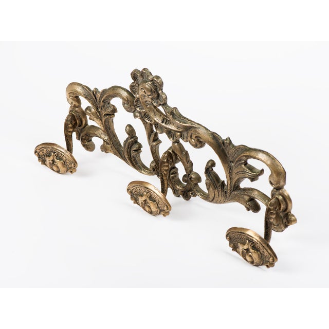 Vintage very heavy ornate cast solid brass coat rack with 3 large domed hooks, Made in Spain circa 1950s. It has 2 holes...
