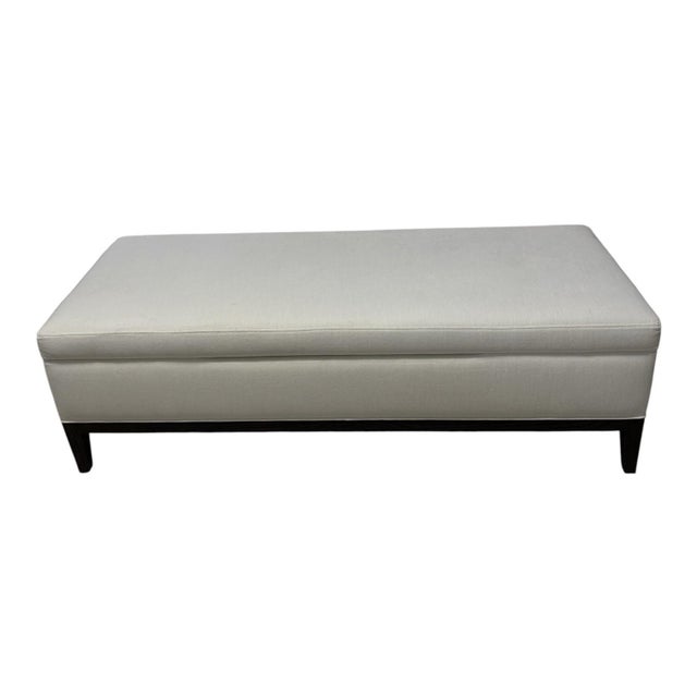 Elegant RH (Restoration Hardware) upholstered storage bench featuring a soft ivory textured fabric and dark oak finished...