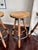 Wood Set of 4 Industrial Tripod Legs Cb2 Acacia Wood Round Seat Adjustable Counter Stools With Wrought Metal Hardware For Sale - Image 7 of 12