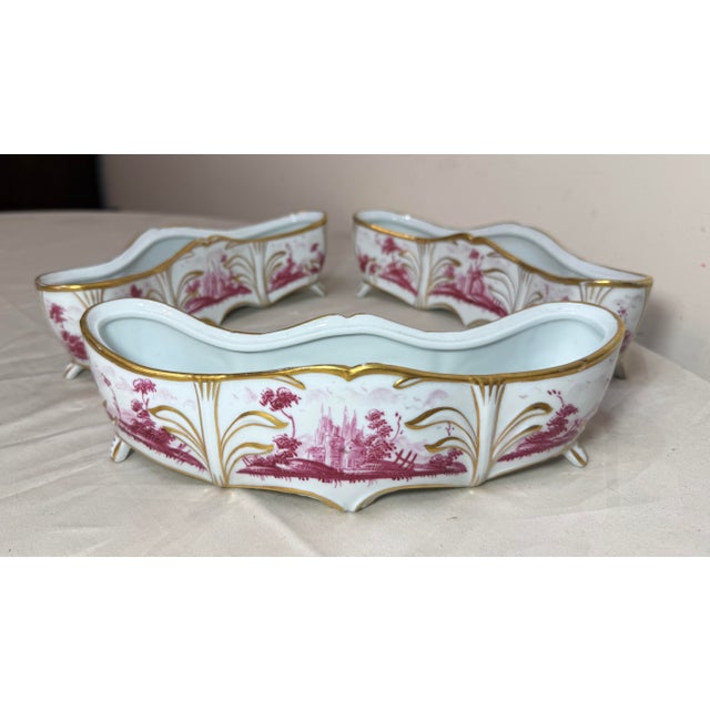 This antique 3-piece Italian Capodimonte porcelain table garniture set is a stunning example of hand-painted porcelain...