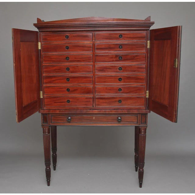 This is a stunning quality 19th Century mahogany collectors cabinet very much in the manner and style of Gillows. The two-...