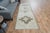 This vintage hand-knotted area rug is a semi-antique vintage area rug. The '70s Eastern region of Anatolian's unique rug...