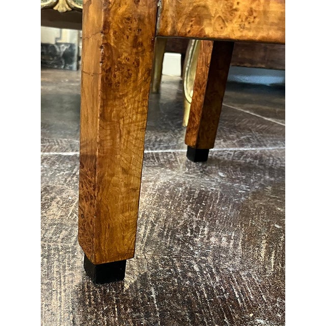 This sturdy mid-century side table has one shelf, perfect for books or a small basket. The feet of the table are square...