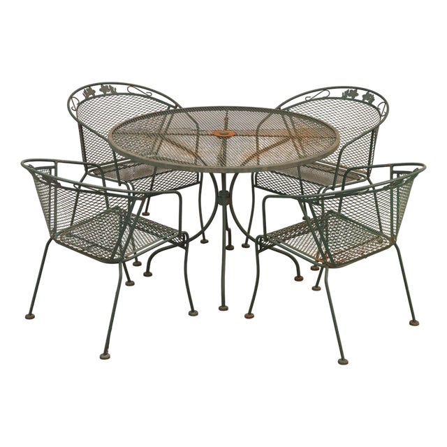 Vintage Wrought Iron Round Patio Table And Four Chairs Set For Sale