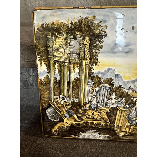 Castelli Majolica Tile Depicting a River Landscape with Architectural Ruins, Boats and Figures in the Foreground, 1970s For Sale - Image 4 of 9