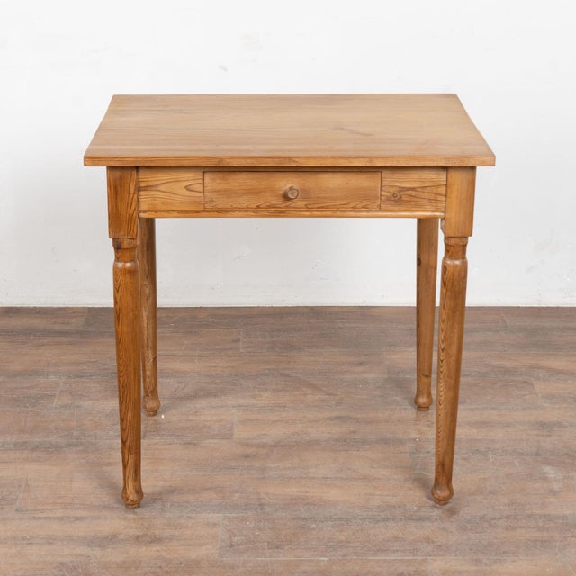 European country pine side table with turned legs and small single drawer. Note the warm, aged patina of the pine. May...