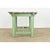 An eye-catching bakery table dating to 19th century France, using a bold red marble top over a simple frame painted a...