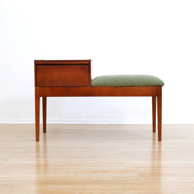 This vintage entryway bench was designed and manufactured in by 'Chippy Heath' during the 1960s. With a wonderful...