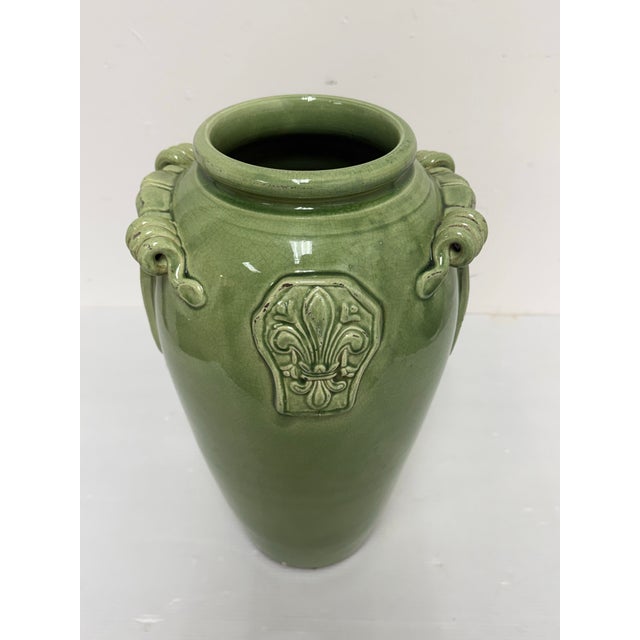 Design Plus Gallery presents a Hand-Decorated Ceramic Vase by Leona for Neiman Marcus. This vase displays a green crackle...