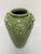 Design Plus Gallery presents a Hand-Decorated Ceramic Vase by Leona for Neiman Marcus. This vase displays a green crackle...