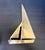 This vintage Brass Sailboat is a lovely example of MCM sculpture it has simple clean lines and the sail is rotatable....