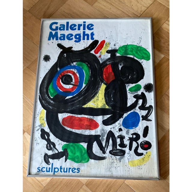 Offset lithograph poster in colors published by Arte Paris / Galerie Maeght, Paris with an original illustration by Miro...