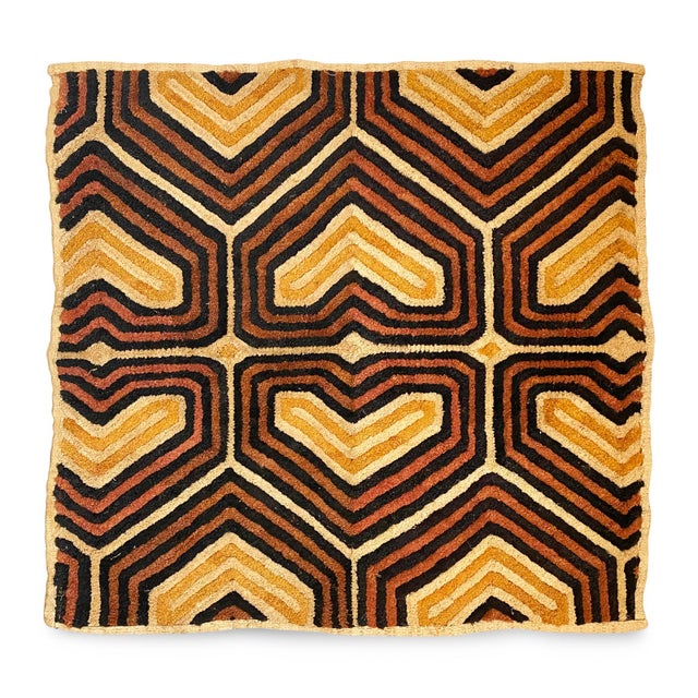 Traditional vintage Kuba grass textile handmade from the indigenous people of the Congo. Bold geometric patterns created...