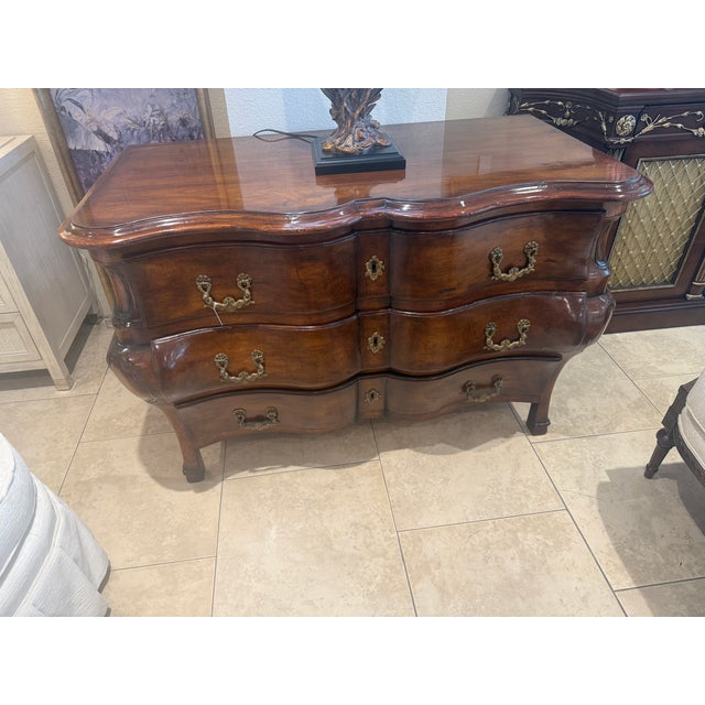 Hand Carved French Provincial Style Bombe Chest with a beautiful Rich Chestnut finish with a wonderful Patina, with...