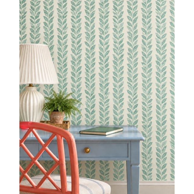 Bring a burst of joy to your walls with our Garden Leaf Stripe Wallpaper, a classic stripe reimagined with hand-painted...