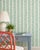 Bring a burst of joy to your walls with our Garden Leaf Stripe Wallpaper, a classic stripe reimagined with hand-painted...