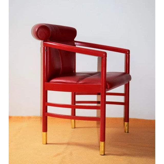 This rare, high -quality leather fabric from Thonet comes from a well -known Viennese law firm. Red leather. Brass cuffs....