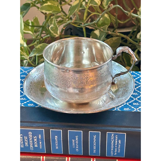 For the collector, this is an antique French .950 silver chocolate cup and trembleuse saucer, bearing Minerva assay marks...