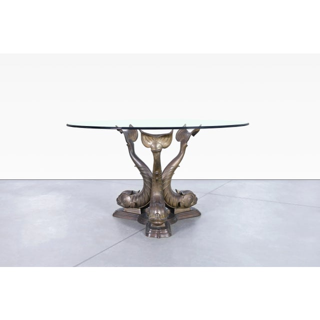Vintage Italian bronze koi fish dining table designed and crafted in Italy, circa 1970s. Featuring a monumental sculptural...