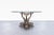 Vintage Italian bronze koi fish dining table designed and crafted in Italy, circa 1970s. Featuring a monumental sculptural...