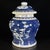 Add a touch of classic Chinese elegance to your space with this vintage blue and white porcelain jar. The piece features...