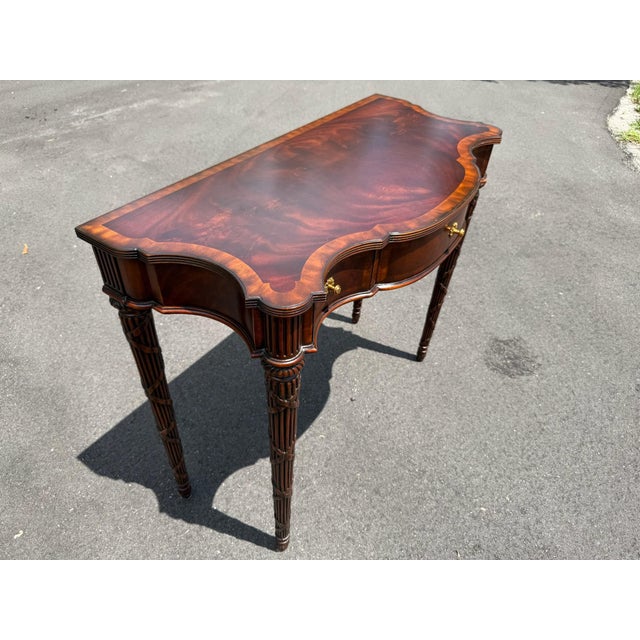 Beautiful vintage Maitland Smith table. Solid wood with brass and carved detail.