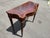 Beautiful vintage Maitland Smith table. Solid wood with brass and carved detail.
