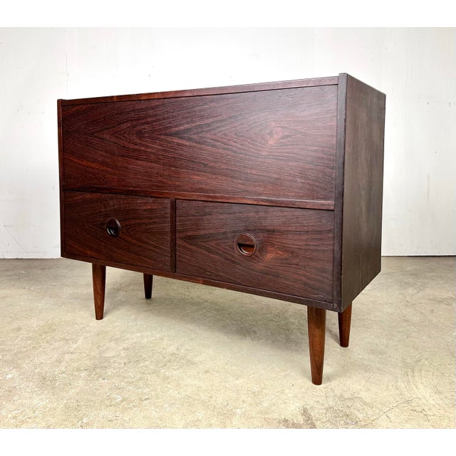 A lovely Danish modular rosewood cabinet by Rud Thygesen and Johnny Sorensen for Hansen & Goldberg Mobler. The cabinet top...