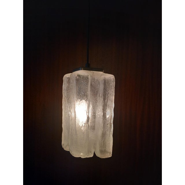 This is a model from the famous "granada" series by the traditional austrian manufacturer j.t. Kalmar. The pendant lamp is...