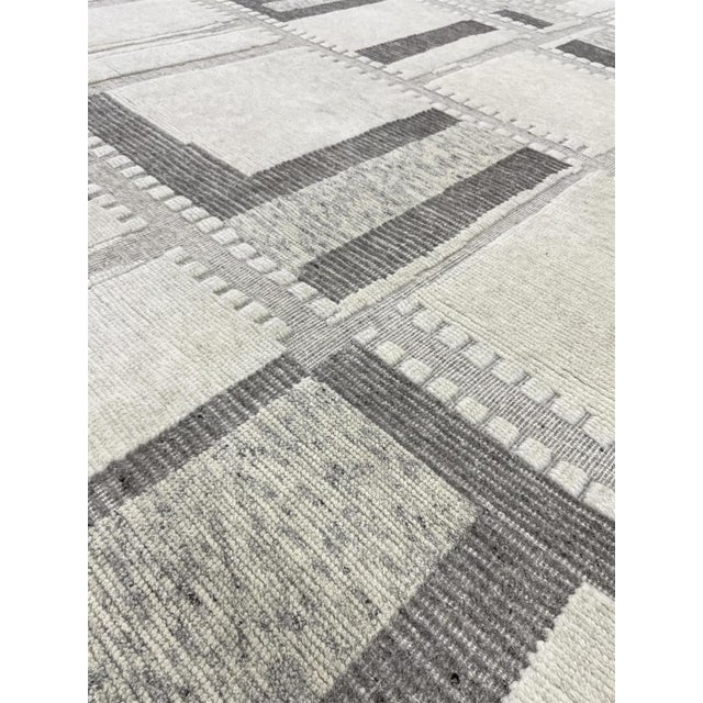 Beautiful hand knotted modern rug. Made of 75% wool and 25% Viscose with very modern design and colors, this extremely...