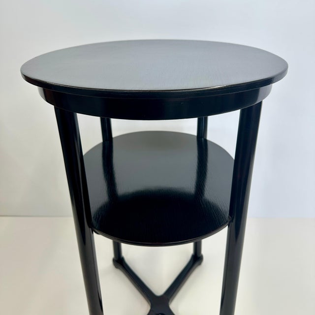 A pair of Vienna Secession oval two-tier side tables from the "Fledermaus" series designed by Josef Hoffmann (1870-1956)....