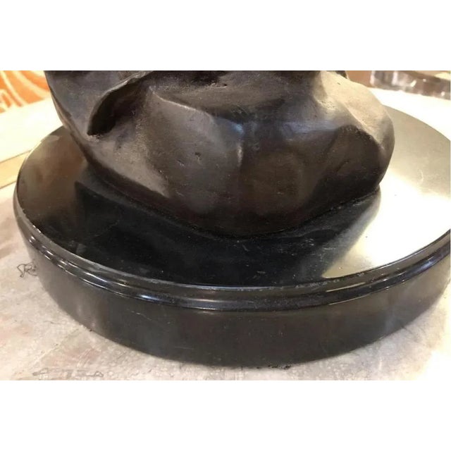 Spellbinding sculpture of a dolphin pod swimming. Made of bronze, this statue will fit perfectly in any indoor or outdoor...