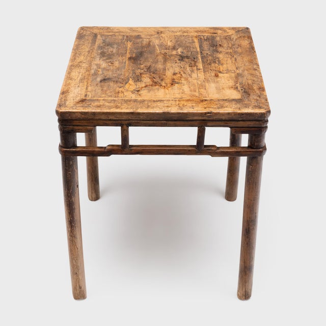 This antique Chinese center table dates to the mid-19th century, crafted of cypress with mortise-and-tenon joinery and a...