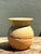 This vintage studio pottery vase is a beautiful study in contrasts, perfectly embodying the Wabi-Sabi philosophy of...
