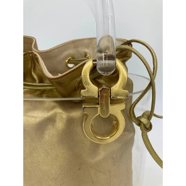 1990s Vintage Salvatore Ferragamo Ganchini Clear Acrylic Bucket Bag with Gold Pouch For Sale - Image 5 of 9