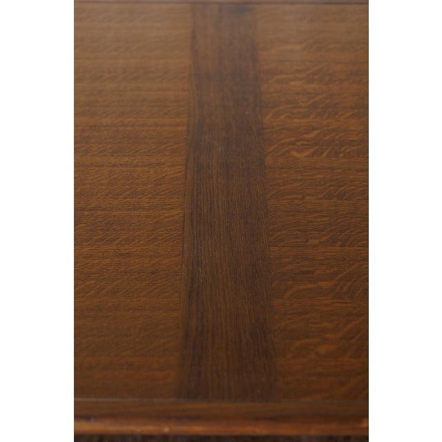 This Mid Century dining table showcases clean architectural lines and a beautifully figured linear veneer pattern that...