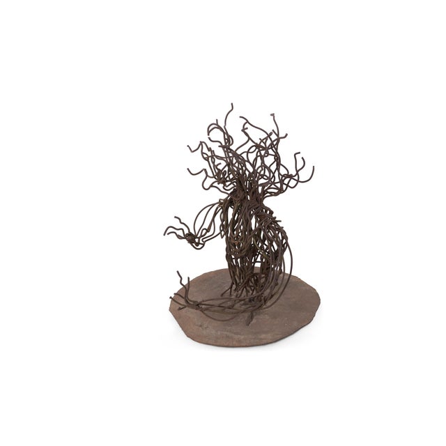 Richard Walsh freeform sculpture. Tubular metal bent and welded to torch-cut circular base, Brutalist in form and patina....