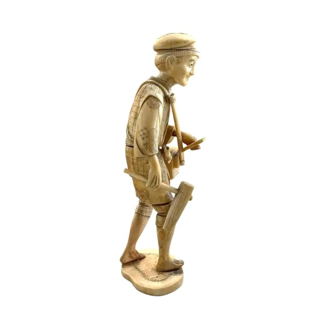 Hand-carved free-standing Japanese Working Man Figurine. Okimono is a Japanese term meaning for display as an art or...