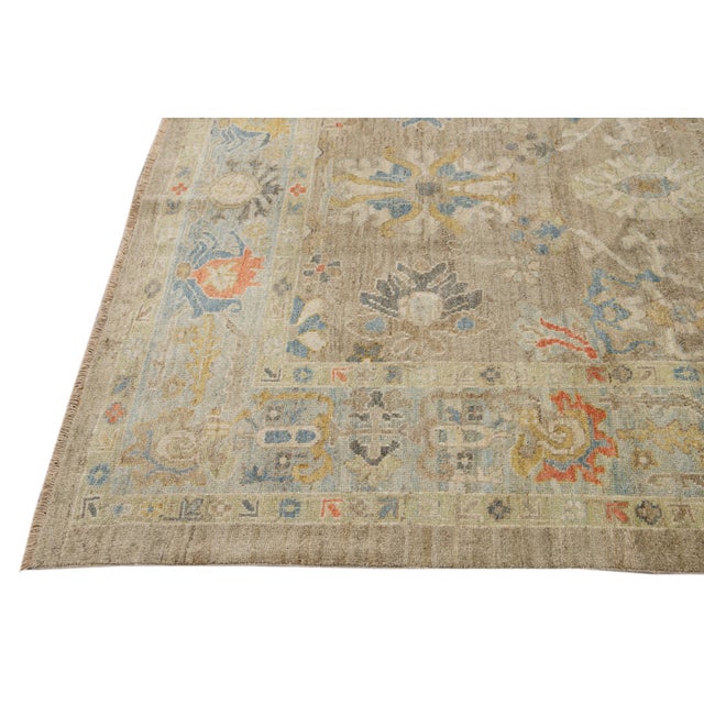 This beautifully handwoven oriental rug, featuring a classic central medallion and intricate floral and geometric...