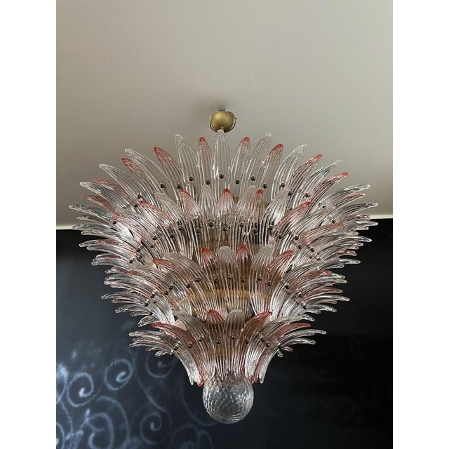 Palmette ceiling light made by 163 Murano pink and trasparent glasses in a gold metal frame. Murano blown glass in a...
