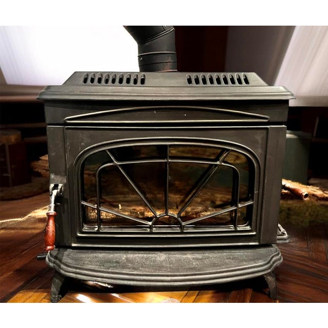 A beautifully preserved Waterford Trinity Mk 2 wood-burning stove by Waterford Stanley, celebrated for its enduring cast-...