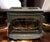 A beautifully preserved Waterford Trinity Mk 2 wood-burning stove by Waterford Stanley, celebrated for its enduring cast-...
