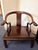 Pair of vintage Chinese horseshoe armchairs. Solid hardwood construction, made in Hong Kong, with carved longevity symbols...