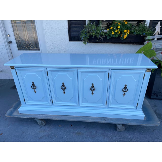 This beautiful refinished Stanley console is a striking blend of classic craftsmanship and fresh, contemporary color....