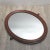 - Art Nouveau mirror with wooden frame - The wooden frame has two round decorations on the edge - The mirror has two small...
