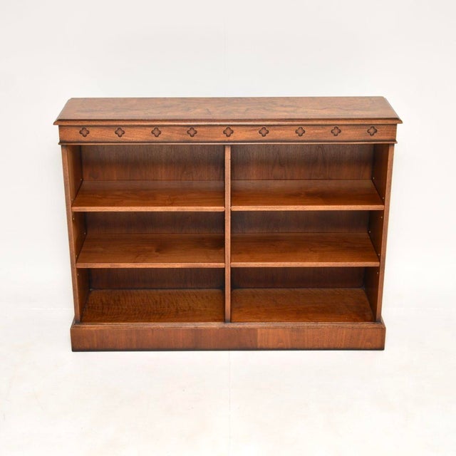 A lovely burr walnut open bookcase in the Victorian style. This was made in England, it dates from around the 1950’s. The...