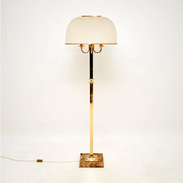 A stunning vintage brass and marble floor lamp, most likely made in Italy and dating from the 1970’s. It is beautifully...