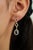 These elegant drop earrings feature 1.61 carats of pear-shaped blue sapphires, set in 14K yellow gold. The sapphire...